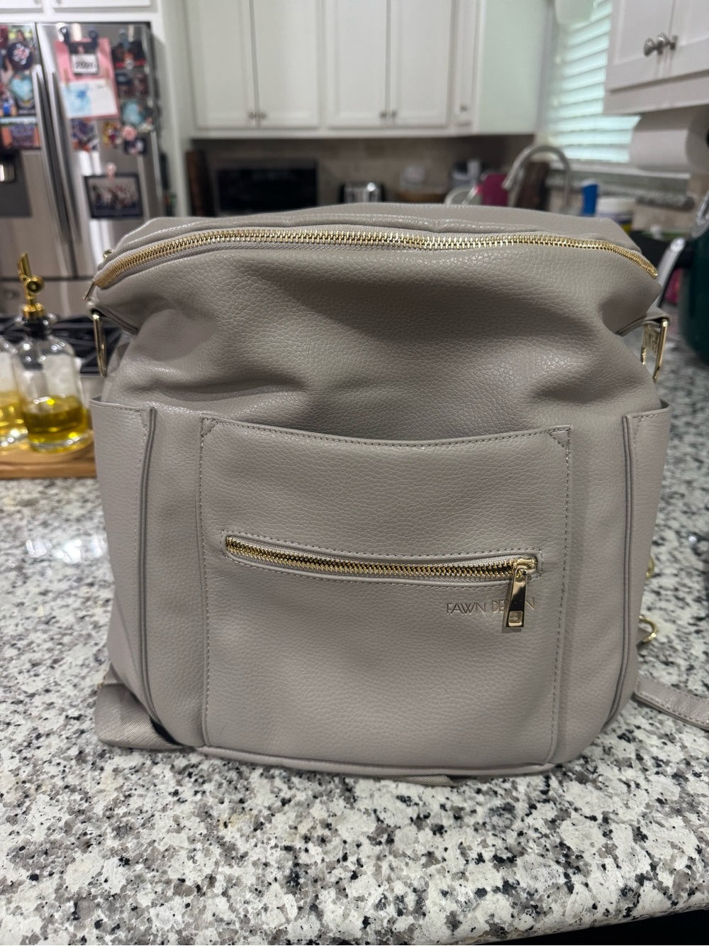 Fawn Design Light Grey Leather Backpack